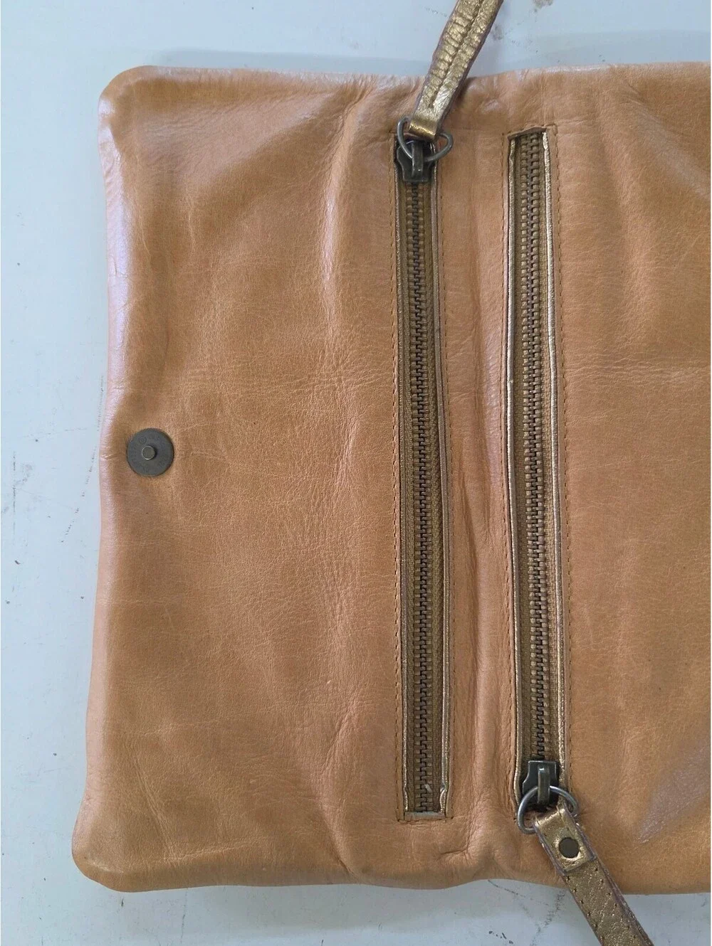 Samvara Leather Wristlet Clutch with Gold Embroidered Detail